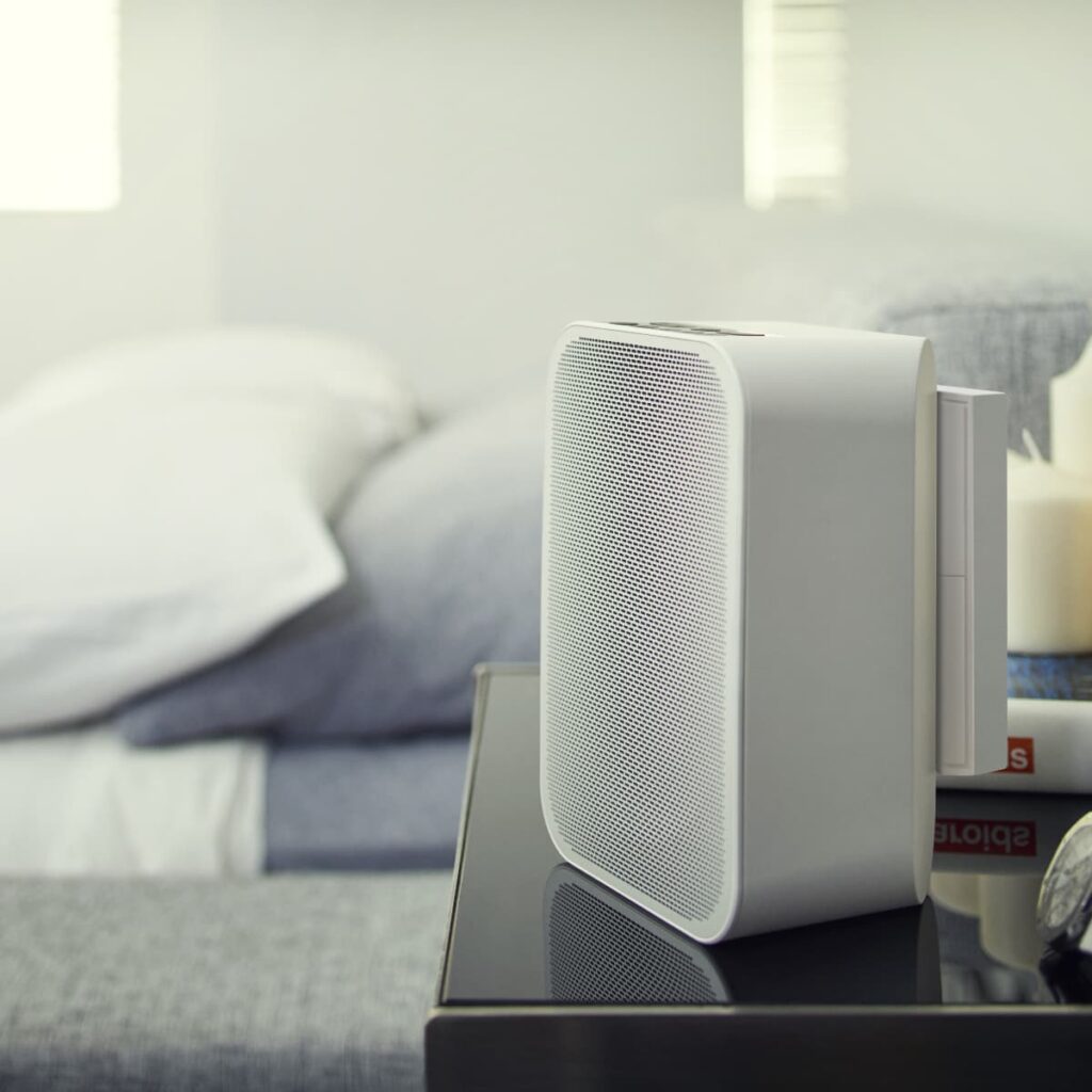 Bluesound Pulse Flex 2i wireless speaker with battery pack in room
